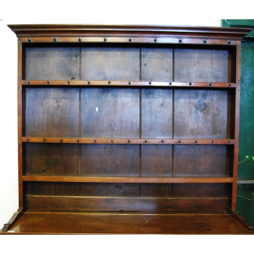 395 - George III style oak Welsh dresser, c. 19th century, the top section with open Delft racks and multi... 