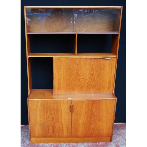 398 - Retro teak display cabinet by S Form, with sliding glazed doors above open shelving and a fall front... 