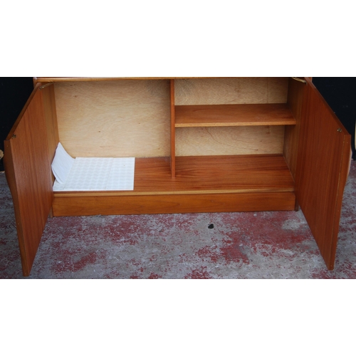 398 - Retro teak display cabinet by S Form, with sliding glazed doors above open shelving and a fall front... 