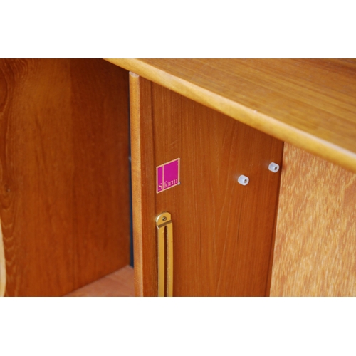 398 - Retro teak display cabinet by S Form, with sliding glazed doors above open shelving and a fall front... 