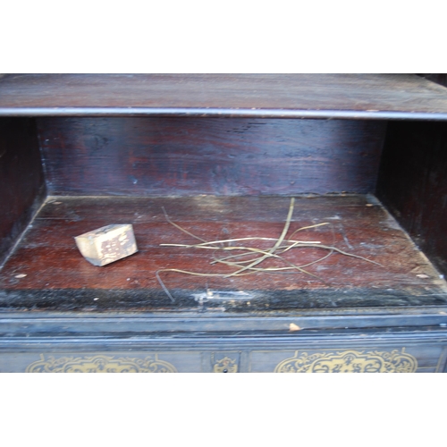 401 - 19th century ebonised Boulle-work cabinet on base, the top section with two doors enclosing a shelve... 