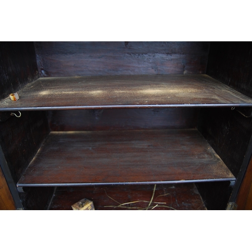 401 - 19th century ebonised Boulle-work cabinet on base, the top section with two doors enclosing a shelve... 