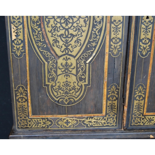 401 - 19th century ebonised Boulle-work cabinet on base, the top section with two doors enclosing a shelve... 