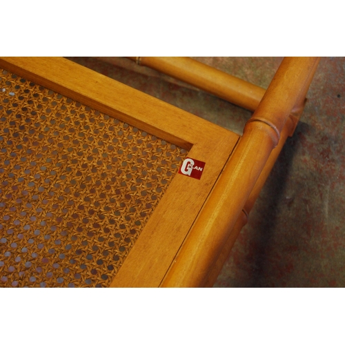 403 - G Plan teak coffee table in the Japanese taste with bamboo-effect frame above a bergère under... 