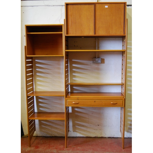 404 - Teak Ladderax unit, c. 1960s, with sliding doors to the top above open shelving and a drawer, flanke... 