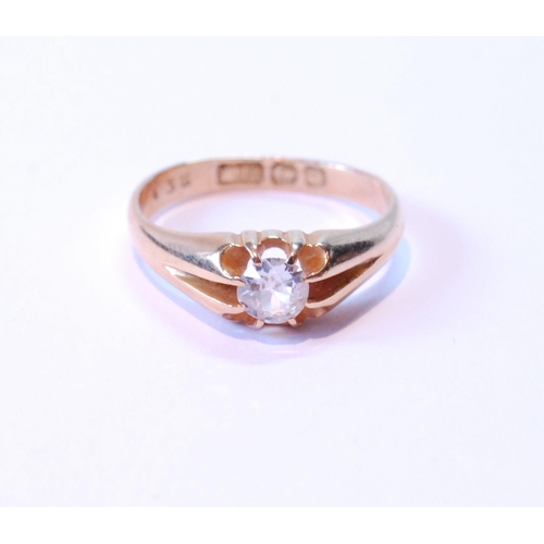 63 - Diamond solitaire ring, approximately .65ct, in gold split shank setting, 1896, size O½.