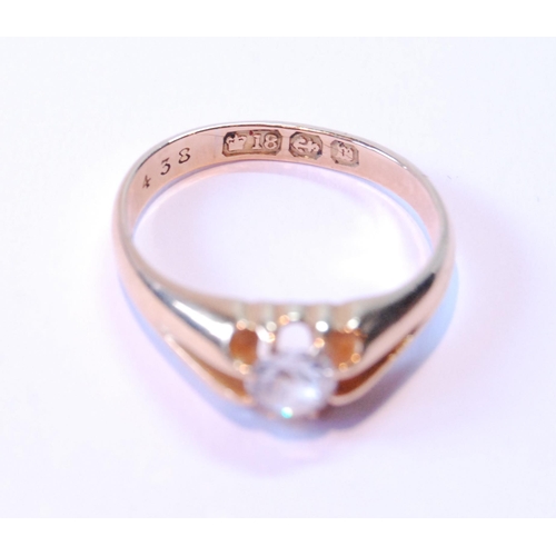 63 - Diamond solitaire ring, approximately .65ct, in gold split shank setting, 1896, size O½.