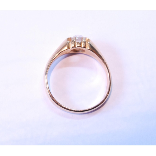 63 - Diamond solitaire ring, approximately .65ct, in gold split shank setting, 1896, size O½.