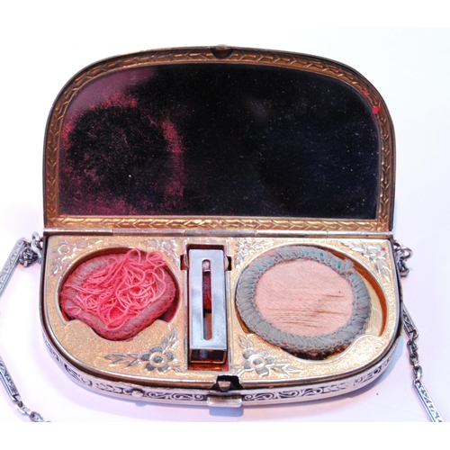 9 - Unusual early 20th century silver compact of half ovoid shape with gilt interior, Sterling.