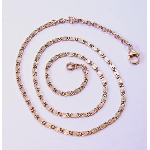 67 - Gold necklet of filed folded links, '750', 17.2g.