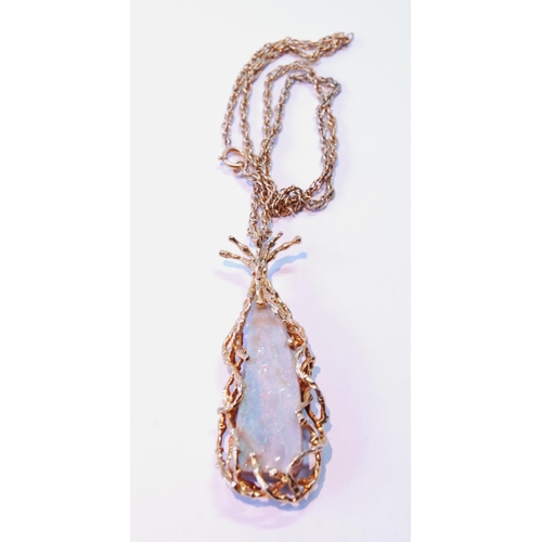 73 - Opal matrix pendant of tapering shape with 9ct gold twiggy mount, 29g gross, on 9ct gold necklet (11... 