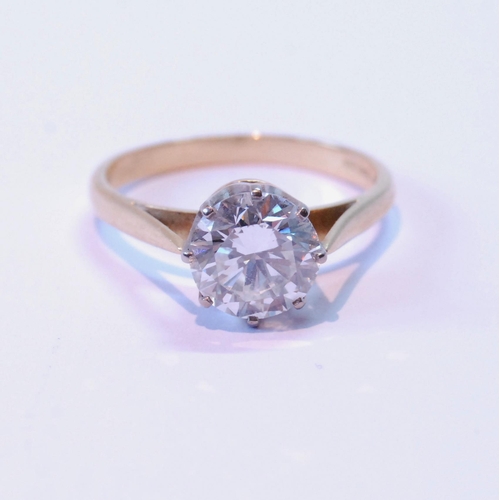 74 - Diamond solitaire ring, the brilliant approximately 2.7ct, in platinum and 18ct gold, size V.