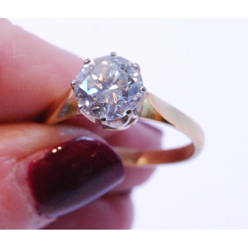 74 - Diamond solitaire ring, the brilliant approximately 2.7ct, in platinum and 18ct gold, size V.