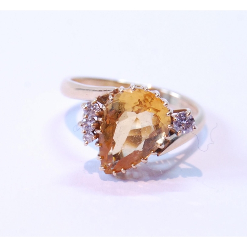 75 - Citrine ring with angled pear-shaped citrine and four diamonds, in 18ct gold, 1992.