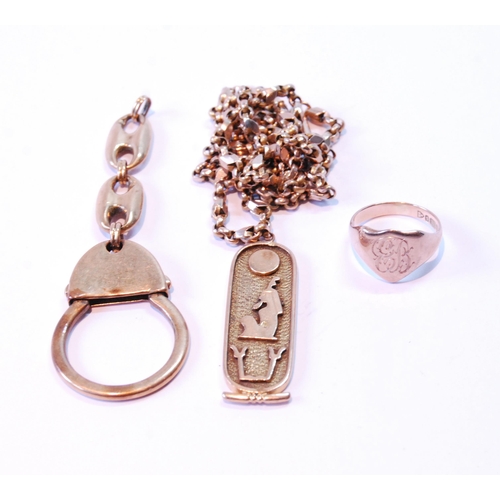 85 - Gold necklet, '9c', a similar ring, an Egyptian pendant and a piece of a key chain, all 9ct, approxi... 