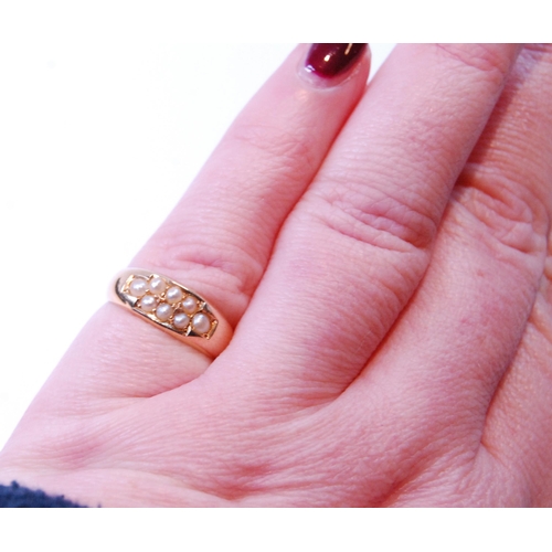 89 - 18ct gold ring with two rows of pearls, 1886, size L, 3.8g.