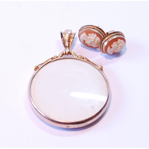 91 - 9ct gold photo locket pendant, 1913, and a pair of cameo earrings.