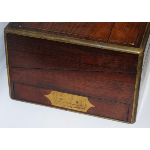 175 - Victorian rosewood writing slope with brass stringing, mounts and carry handles, enclosing a velour-... 