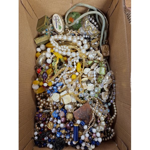 166 - Box containing costume jewellery to include necklaces, bracelets, etc.