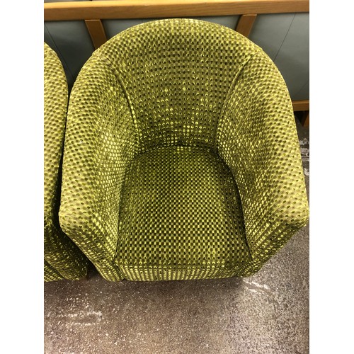 538 - Six green upholstered tub chairs.