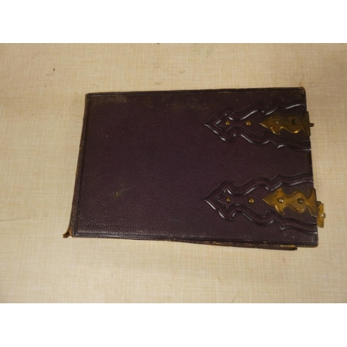 51 - Victorian Photograph Album, oblong 8vo in embossed morocco with clasps, the leaves stamped 