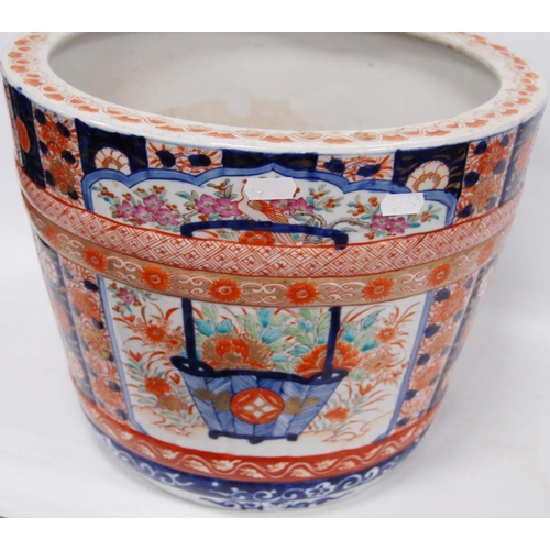 288 - Oriental jardinière in the Chinese style decorated with Imari, famille rose and Kangxi-style scrolls... 