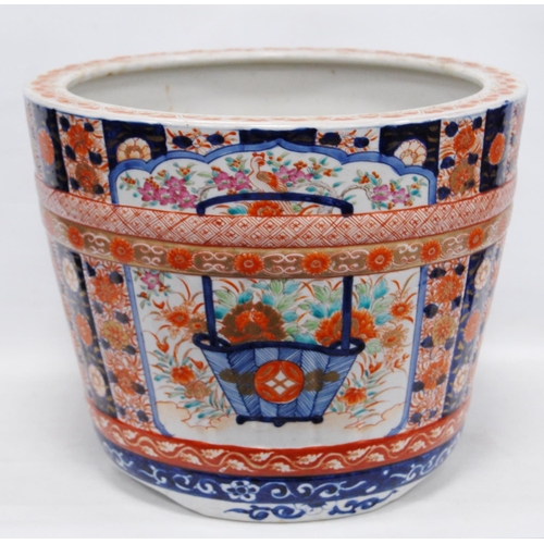 288 - Oriental jardinière in the Chinese style decorated with Imari, famille rose and Kangxi-style scrolls... 