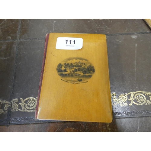 111 - Mauchline ware bound photograph album enclosing photos of Wetheral, Corby Castle etc.