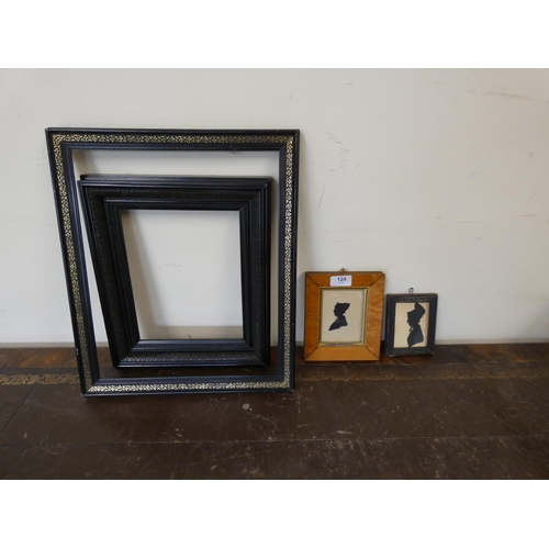124 - Two Regency style silhouettes and two ebonised picture frames. (4).