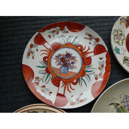 99 - Collector's plates including three hand painted examples.