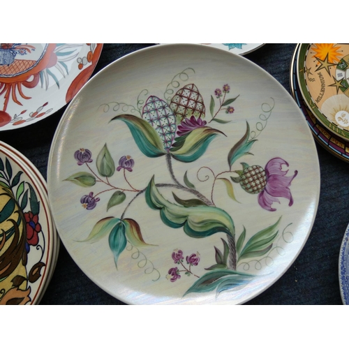 99 - Collector's plates including three hand painted examples.