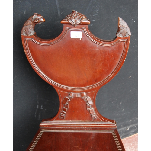 659 - 19th century mahogany hall chair by Gillows of Lancaster, with eagle surmounts to the shield-shaped ... 