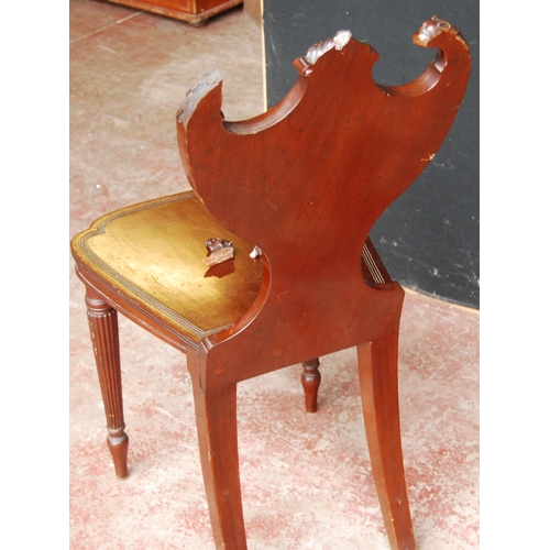 659 - 19th century mahogany hall chair by Gillows of Lancaster, with eagle surmounts to the shield-shaped ... 