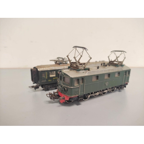 144 - Marklin Railways. Collection of 00 gauge engines, rolling stock and track comprising of TM800 locomo... 