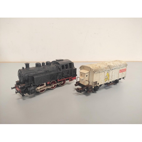 144 - Marklin Railways. Collection of 00 gauge engines, rolling stock and track comprising of TM800 locomo... 