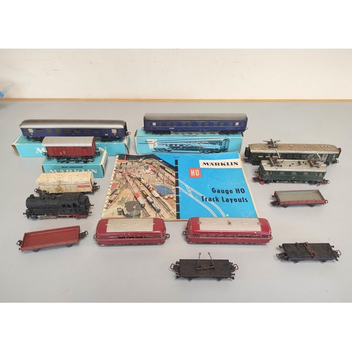 144 - Marklin Railways. Collection of 00 gauge engines, rolling stock and track comprising of TM800 locomo... 