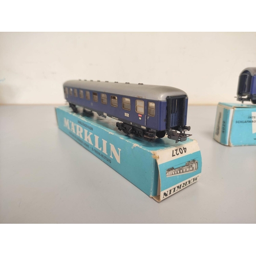 144 - Marklin Railways. Collection of 00 gauge engines, rolling stock and track comprising of TM800 locomo... 