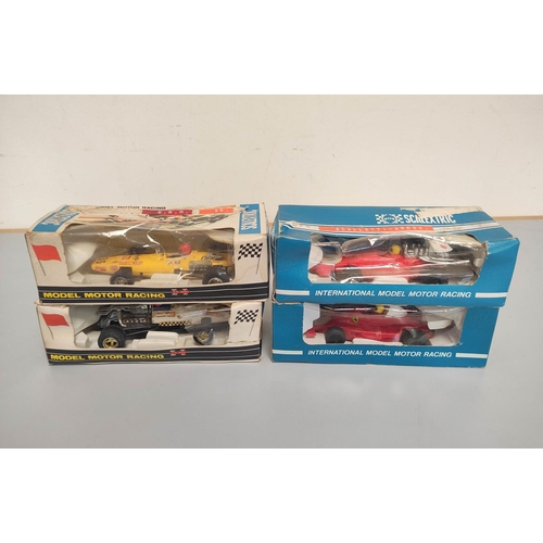 66 - Scalextric Rovex. Four 1960s/70s boxed vehicles comprising of Ferrari GT330 C.41, Ferrari 312T C.124... 