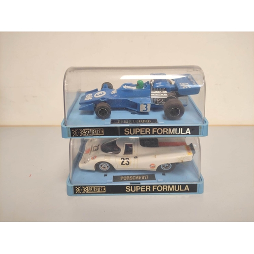 69 - Scalextric Super Formula. Eleven boxed vehicles comprising of Ferrari GT, Ferrari 312B2, Porsche 917... 