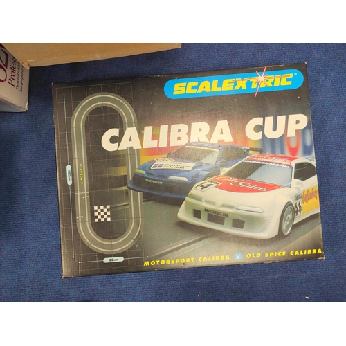 70 - Scalextric. Large collection of track and components to include three boxes of track and a Calibra C... 