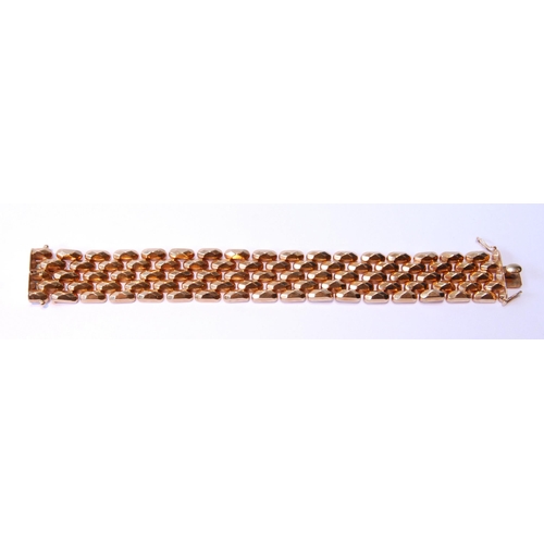 105 - 18ct gold bracelet of faceted links, late 20th century, 35g.