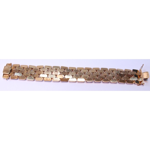 105 - 18ct gold bracelet of faceted links, late 20th century, 35g.