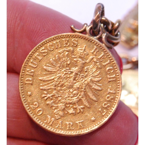 107 - 9ct gold bracelet of fetter and ring pattern with two sovereigns, 1911 and 1958, 20 marks, 1887, a h... 