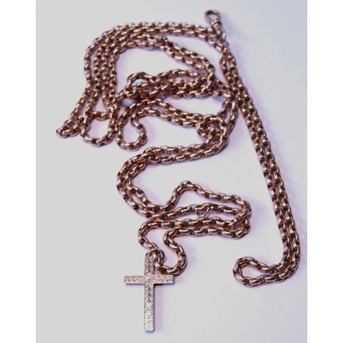 109 - Victorian gold long chain of oval links, '10', with 9ct cross dependant, 55g.