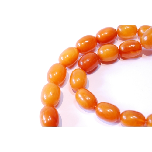 115 - Amber graduated bead necklace, 85g.