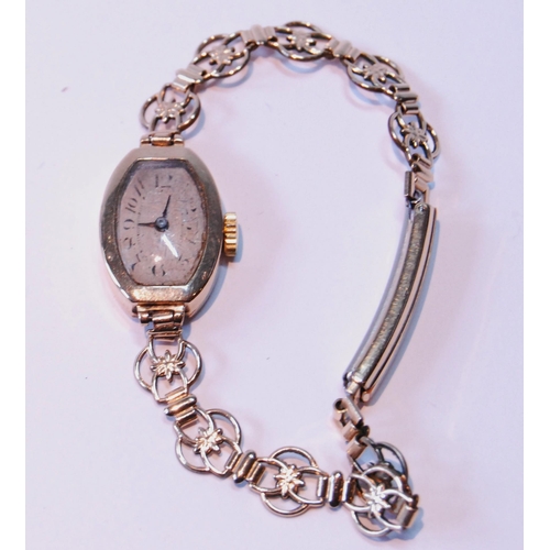 156 - 9ct gold lady's watch, 1925, on rolled gold bracelet.