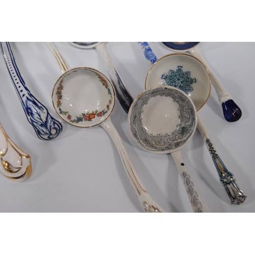 236 - Group of pottery sauce and soup ladles, c. 19th century, with assorted decoration, to include blue a... 