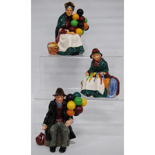 242 - Royal Doulton figures, 'The Old Balloon Seller', HN 1315, 16cm high, 'The Balloon Man', HN 1954, 18c... 