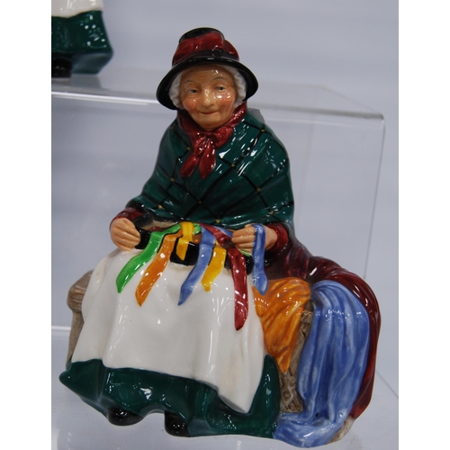 242 - Royal Doulton figures, 'The Old Balloon Seller', HN 1315, 16cm high, 'The Balloon Man', HN 1954, 18c... 