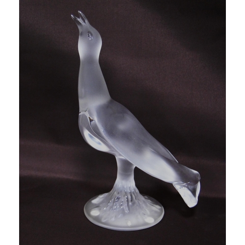 215 - Lalique of France frosted glass figure of a bird (20th century) terminating on a fixed circular foot... 